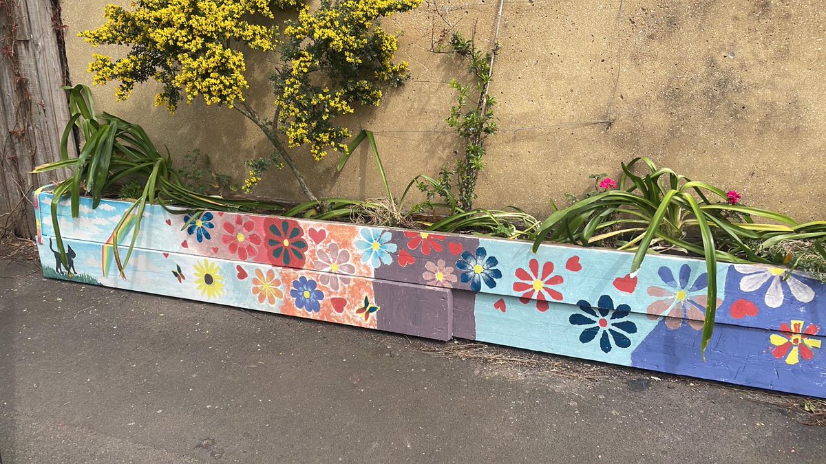 Been painting the planters on the corner of our road with our lovely neighbours this morning.