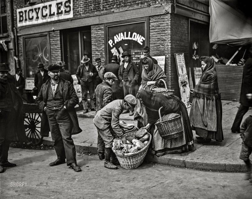 Italian bread sellers on Mulberry Street, New York, circa 1900