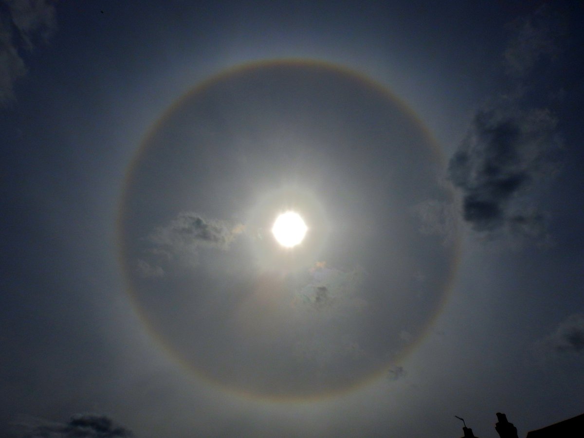 A 22-degree halo spotted over Thames Ditton, Surrey, UK, by @mildthing99