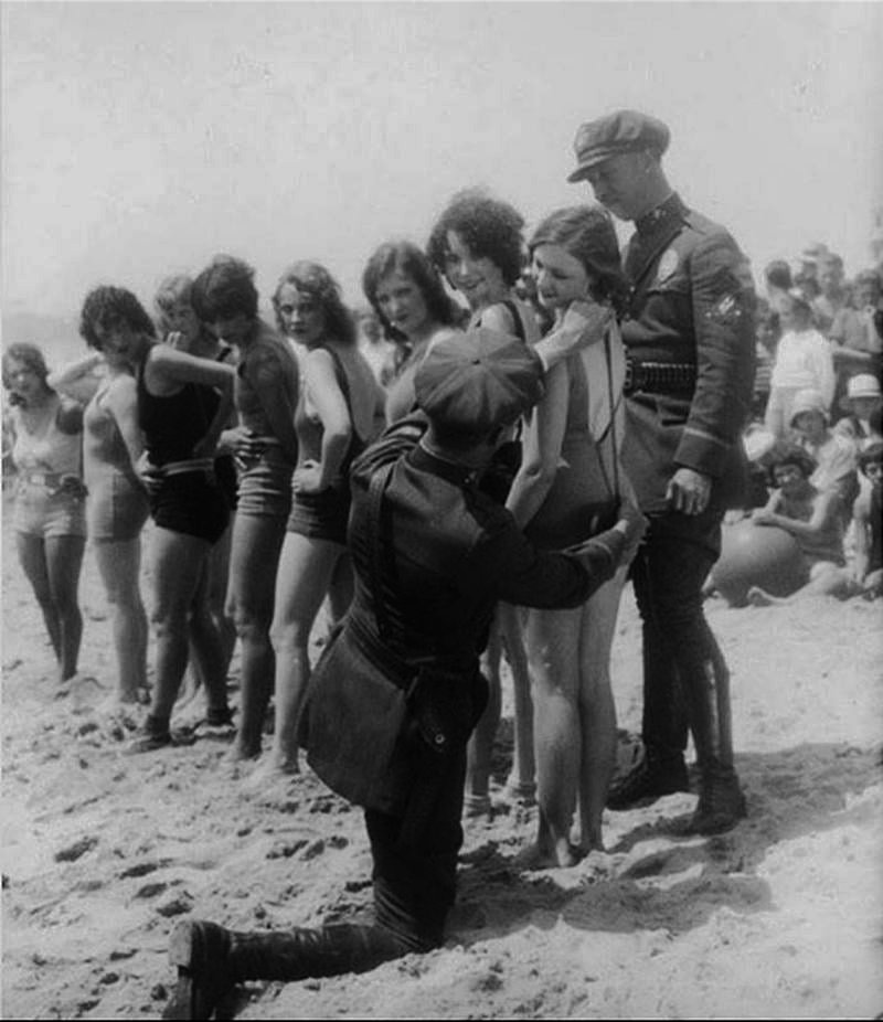 Bathing suit censors with their tape measure at Venice Beach, California in 1929.
