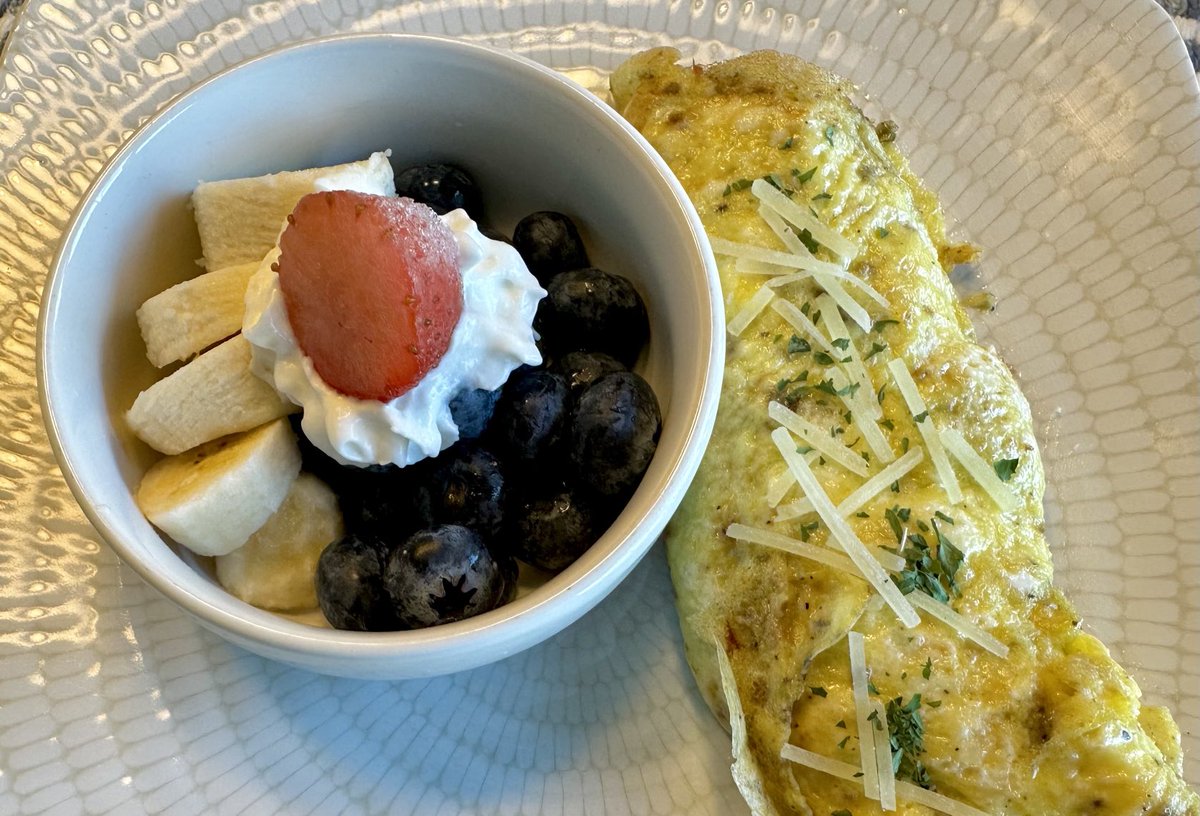 One egg omelette (with spinach, red onion, Kalamata olives, goat cheese) and fruit. It’s what’s for breakfast.