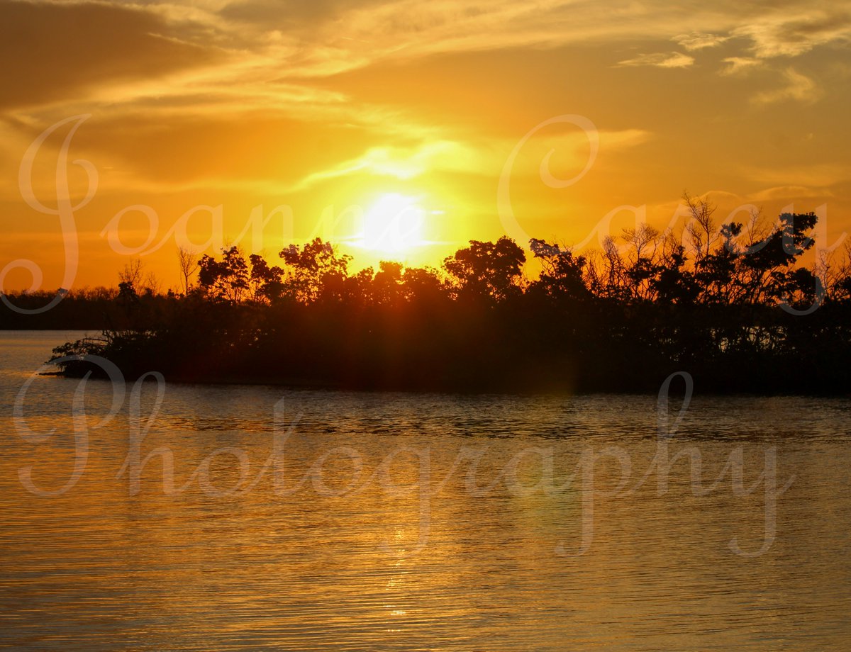 'Sunrise over Pelican Island' 🧡🧡🧡 I love sunrises, nature and pelicans! The island you see is often called home by #brownpelicans as well as other birds. Nature is awesome and soothes my soul! 🧡🧡🧡 #sunrisephotography #NatureBeauty #itsthelittlethings