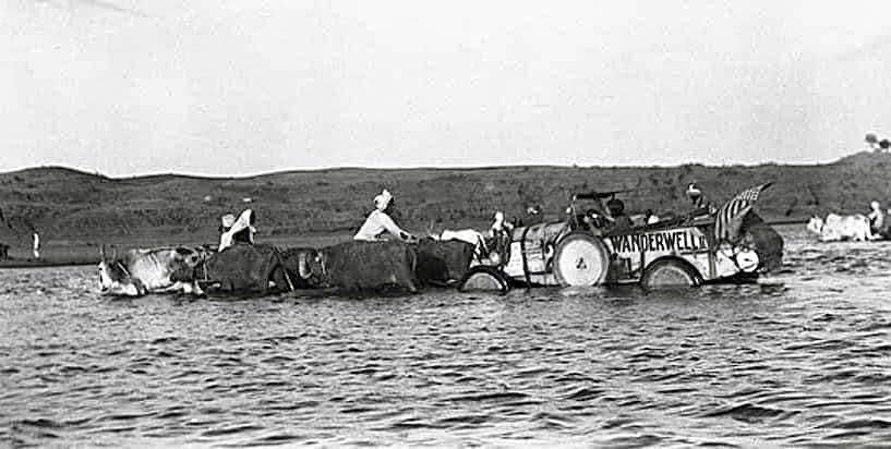 1927 Aloha in her Model T Ford being towed across a large river including another Ford in back. The water is over axles, can you imagine trying to navigate in the roaring 20’s and 30’s in area’s where there were no roads, on narrow tires and wide rivers of water, sand or mud! RDT