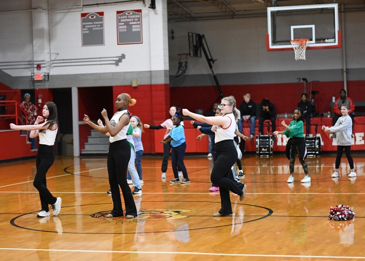 WinonaDistrict's tweet photo. The students at WES will rock their tests! Such an exciting pep rally for grades 3-6! Thank you to the WHS cheerleaders, dance team, the drum line, and especially to the MSU football players for pepping the students up! #RockThatTest #TheTigerWay https://t.co/OGBOax2khx