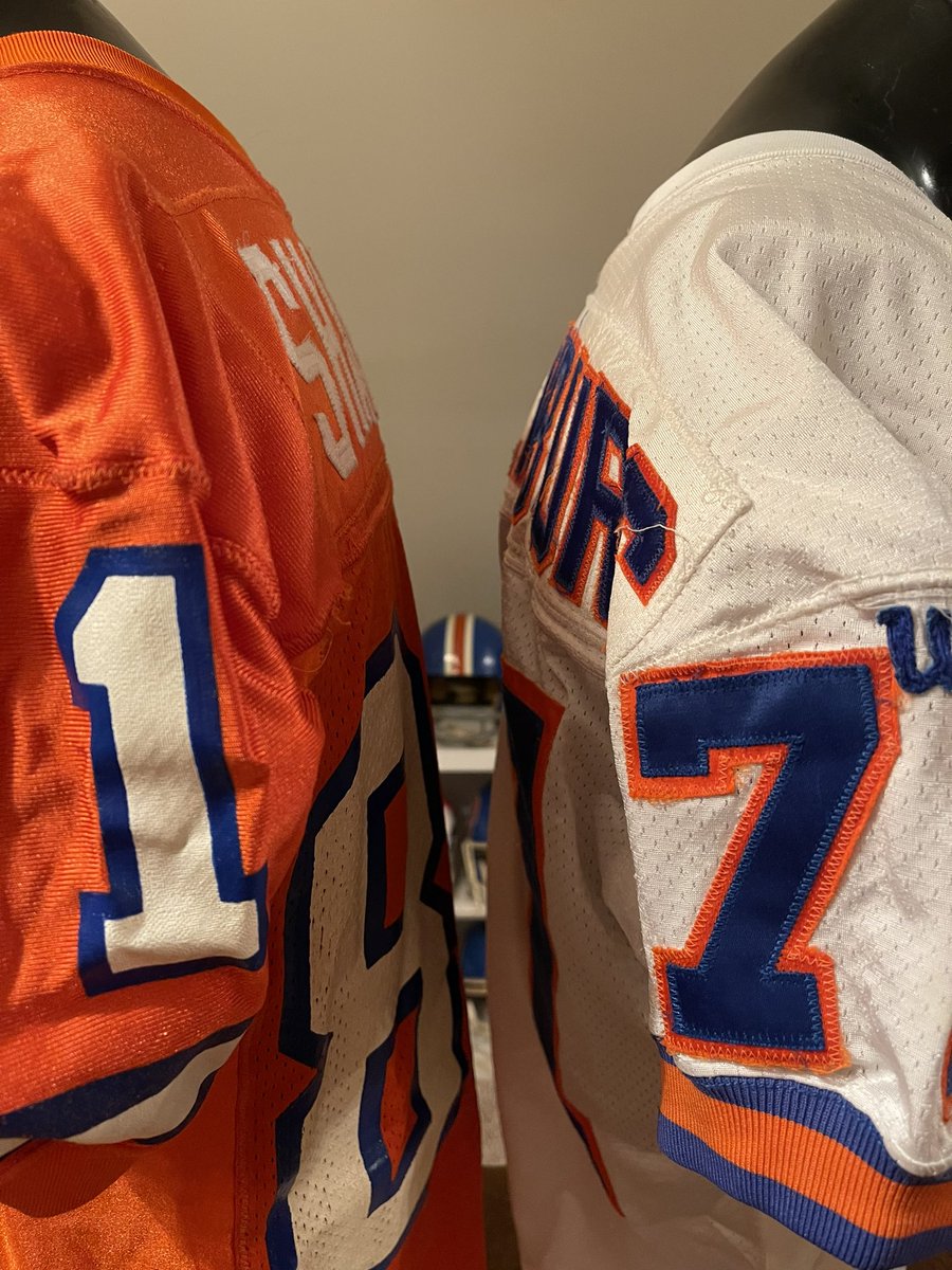 In 1994 the @Broncos made a change to their uniforms, moving from screen printed numbers to sewn on tackle twill numbers.  The jersey in the left was worn in 1990, the one on the right was worn in 1994. #BroncosCountry