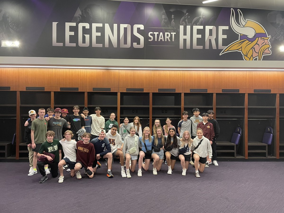 Our kids in the Minnesota Vikings locker room