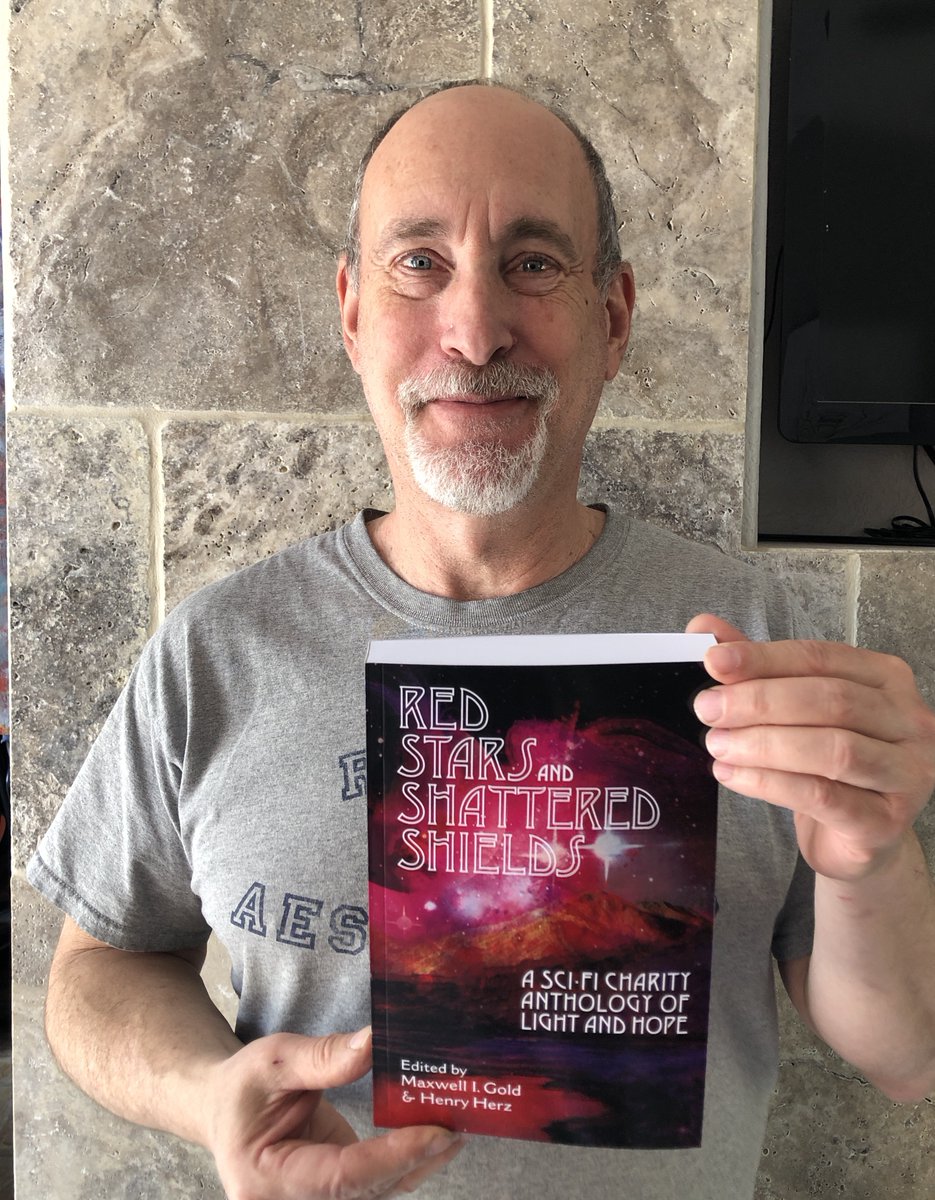 Just got my co-editor copy of Red Stars & Shattered Shields, an adult #SciFi #anthology to raise money for @AFMDA. You can order a copy at amazon.com/Red-Stars-Shat…