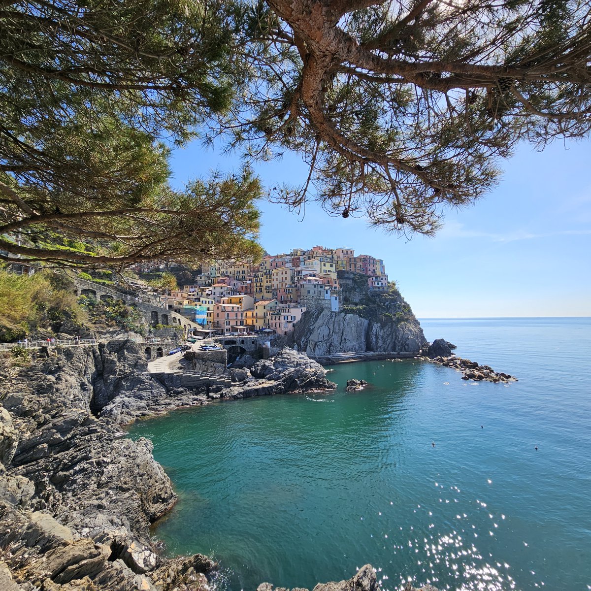 I recently returned from Italy. This is a shot I took looking out at Manarola, one of five villages in Cinque Terre on the Ligurian Sea.
