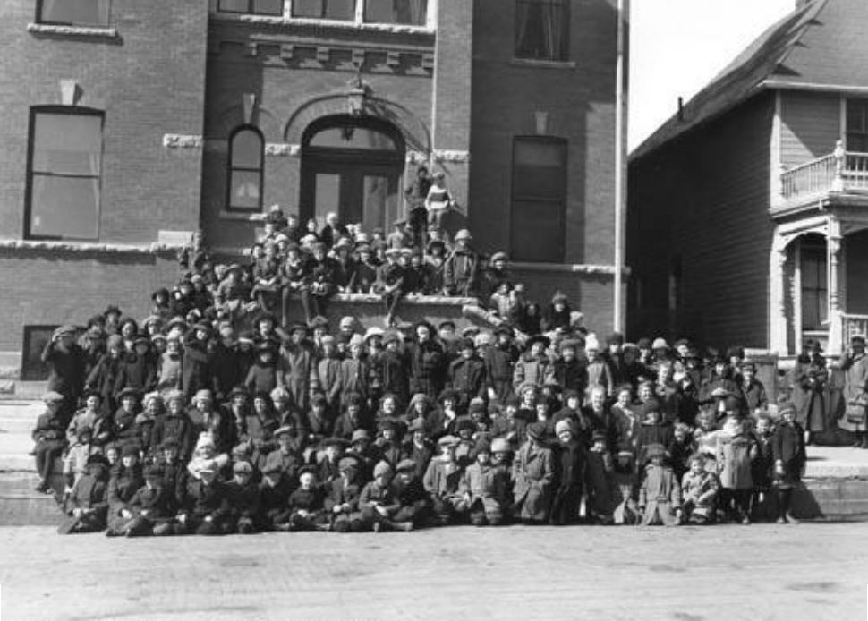 Apr15, 1924 • Primrose Makers Photo taken outside Edmonton Club (10020-McDonald Drive) - 100 years ago - after children delivered 31,000 artificial primroses to the Red Cross Society to be used for fundraising. See ALT. 📌#EdmontonWhenAndWhere 📷Glenbow Archives