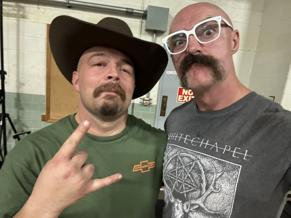 Just a couple dudes with bald heads, great lariats, and greater mustaches. @1called_manders