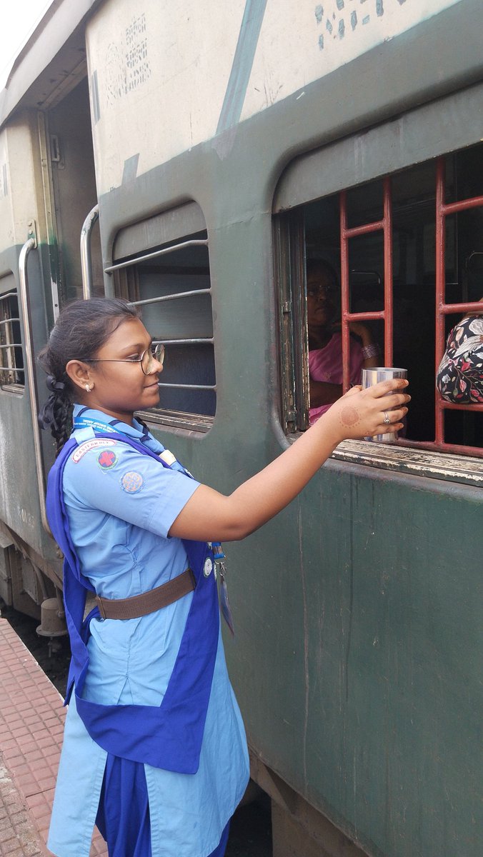 Drinking Water Service is being carried out at Andal Station for the Passengers in Stopping Trains by the Members of The Bharat Scouts and Guides of Asansol District.