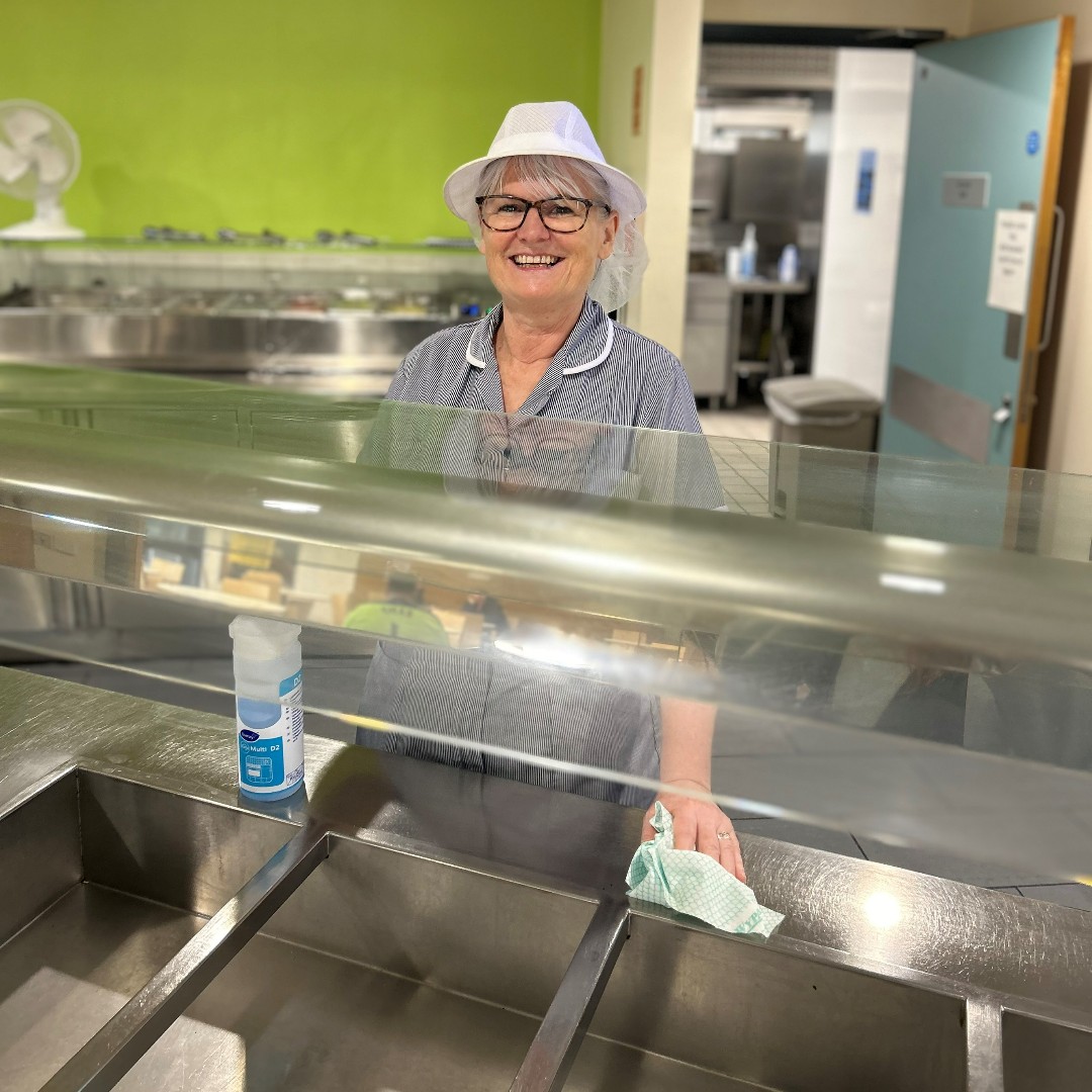 Della has been a Catering Assistant for 28 years. She loves her job, and it is clear to see as she serves patients, staff and visitors with a smile, joke and kindness in the Ysbyty Aneurin Bevan Canteen. Keep up the good work Della, you are adding smiles to everyone’s day!