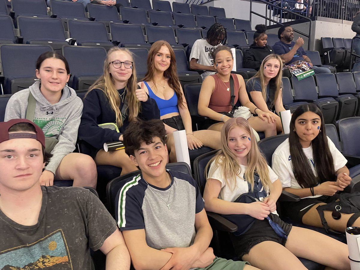 Riverbend_SP's tweet photo. Kids settling into the Timberwolves game https://t.co/pliHu1IkKA