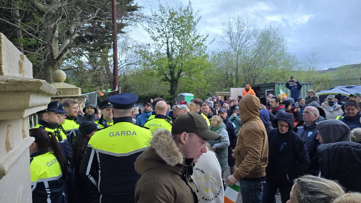 Large protest underway at River Lodge Trudder Newtownmountkennedy as Gardaí have opened the gates of the premises to allow security staff to leave the site. Locals have demanded that the gate be relocked and nobody else allowed in.