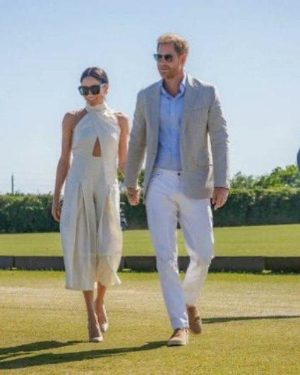Unapologetically beautiful #PrincessMeghan with hubby #GoodKingHarry