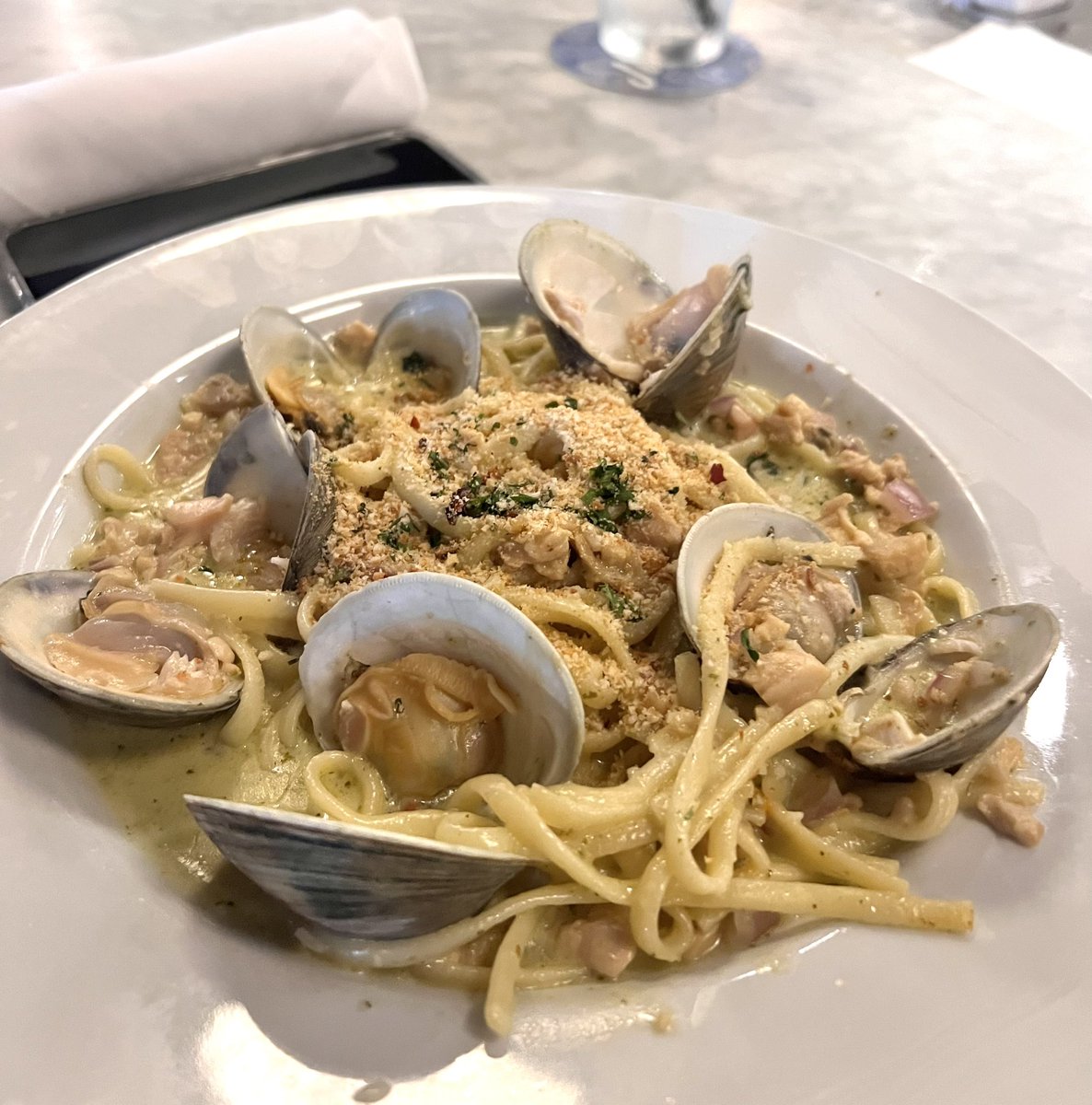 Savory bolognese and and linguine with clams washed down with a delicious red and an #aperolspritz at @JulietItalian #atx #austineats #ATX #atxfood