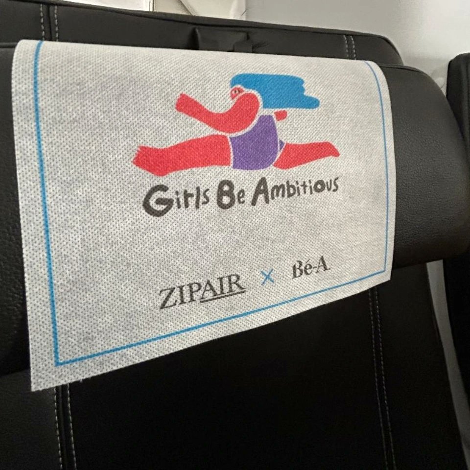 [#JAPANTRAVELSERIES] As I boarded the #ZipAir plane, I noticed this logo & 'ZipAir x Be-A' collaboration called 'Girls Be Ambitions' at the entrance plane door and on each seat headrest. It prompted me to research and find out what this program is about. #GBA #BeA @ZIPAIRTokyo