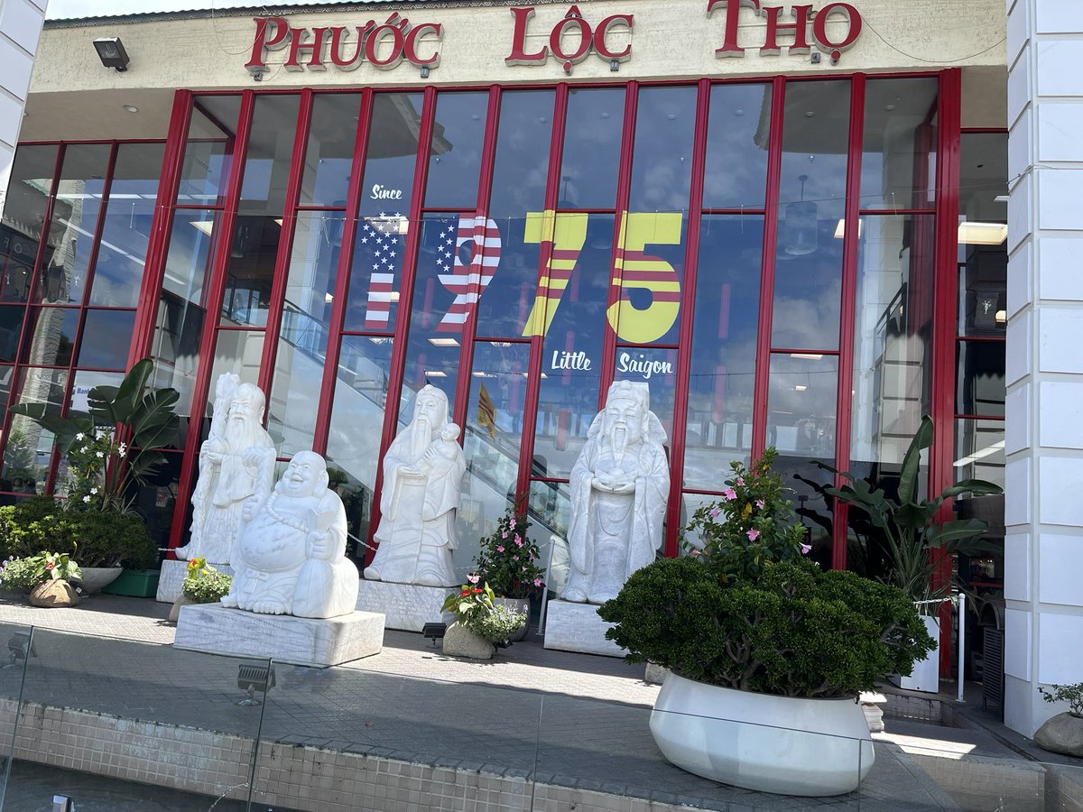 Hello white peoples, these statues are in Little Sàigon, Garden Grove, California: happy-luck-longevity and a fatty Buddha.