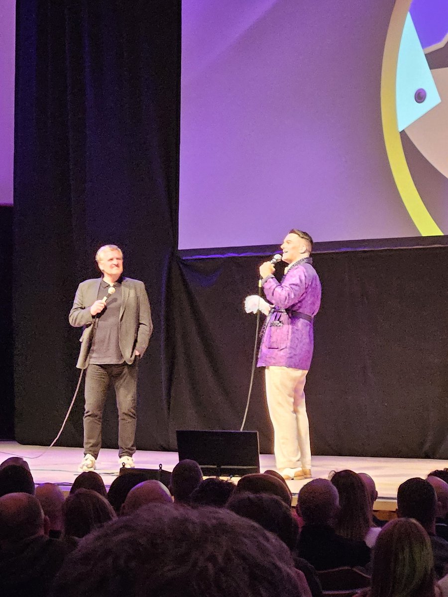 @TroyHawke gracing the stage of the @liverpoolphil dressed like a perfectly tailored purple Quality Street. Incredibly funny and supported by his mentor, the legend that is @JanMolby 💯🙌🏽
