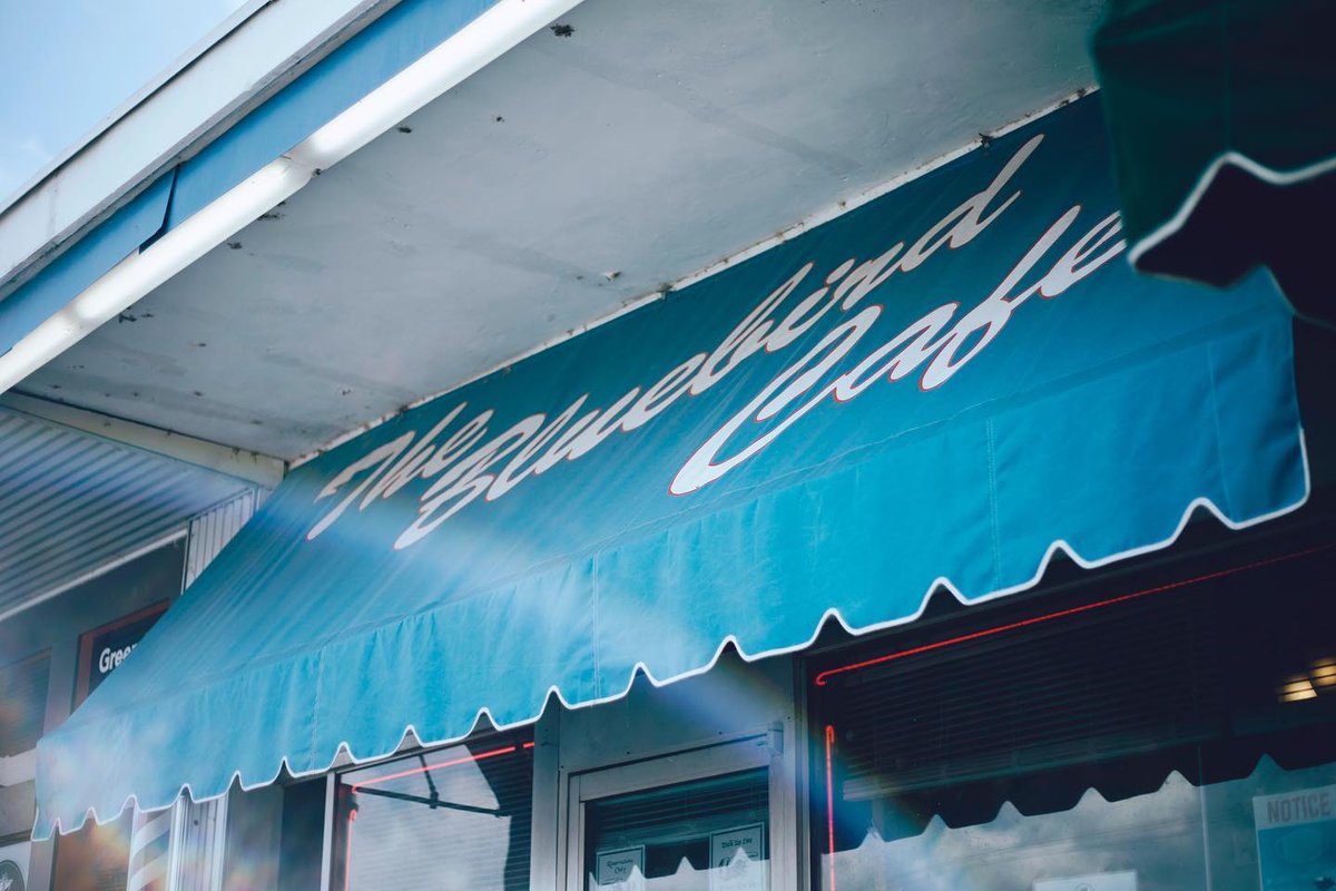 When you see that blue awning, you just know you're in for some good tunes! 🎶 What artists have you seen grace the @bluebirdcafetn stage? 📸: @BluebirdCafeTN