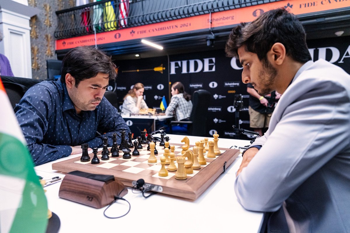 ChessbaseIndia's tweet photo. Vidit Gujrathi bounces back strong! After a tough loss in Round 8 of the Candidates tournament, Vidit played a fantastic game with the White pieces to take down the World no.3 - Hikaru Nakamura.

The game was dynamically balanced till a point. Vidit had won a pawn in the middlegame, but Nakamura was getting it back. However, Nakamura chose the wrong capture 27...Nxe5? and Vidit found a nice tactical shot with 28. Bxe5 Bxe5 29.Nxd5! now gaining back the pawn.

Things fell apart very quickly for Nakamura after this. Vidit got a huge attack against the Black King, and finished off in style with a Rook sacrifice - forcing resignation!

This was a hugely important win for Vidit to stay in the fight for the top spot. Vidit has 4.5/9 points now - he will face Praggnanandhaa with the Black pieces on the 10th round.

Photos: Michal Walusza, Maria Emelianova 
#chess #chessbaseindia #ViditFTW #candidates2024