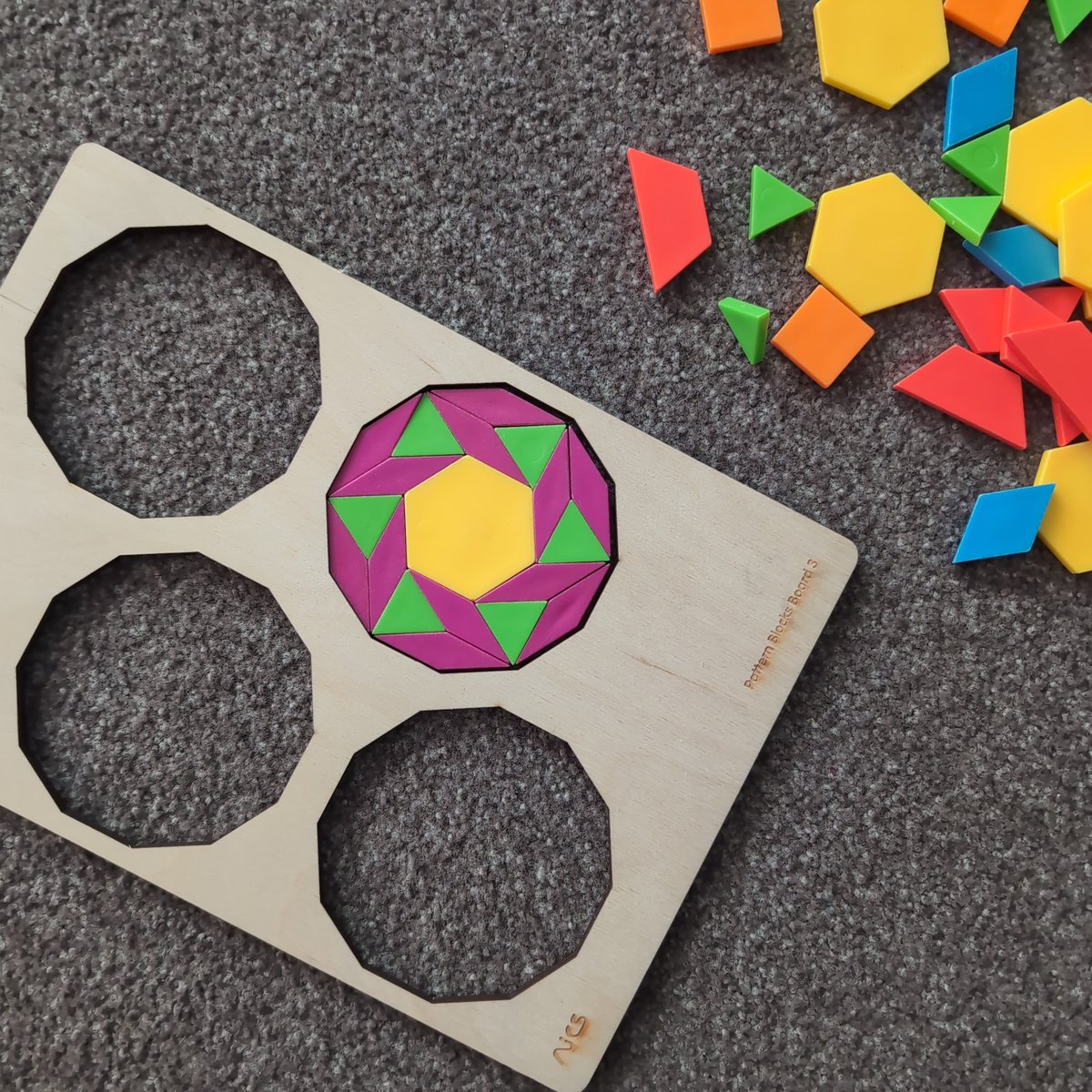 Ooh, setting up for the morning play. Never made this one before myself! Can't believe 10 years into using pattern blocks I'm still finding new things...