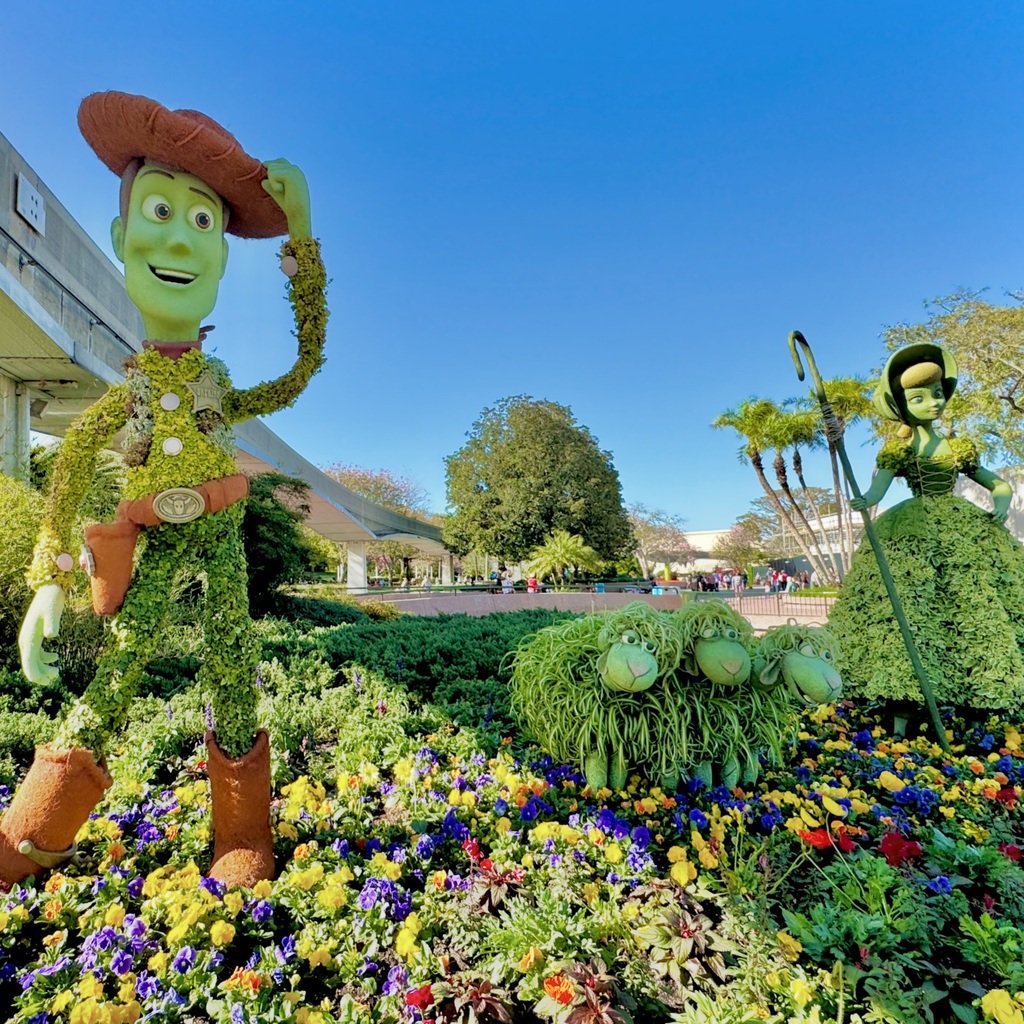 MousePlanet's tweet photo. Woody, Bo Peep &amp; Sheep topiaries at 2024 EPCOT International Flower &amp; Garden Festival. 

#FreshEPCOT #WaltDisneyWorld #EPCOT #toystory #topiaries https://t.co/4Rzd9zsw0w https://t.co/LSKipY0cyR