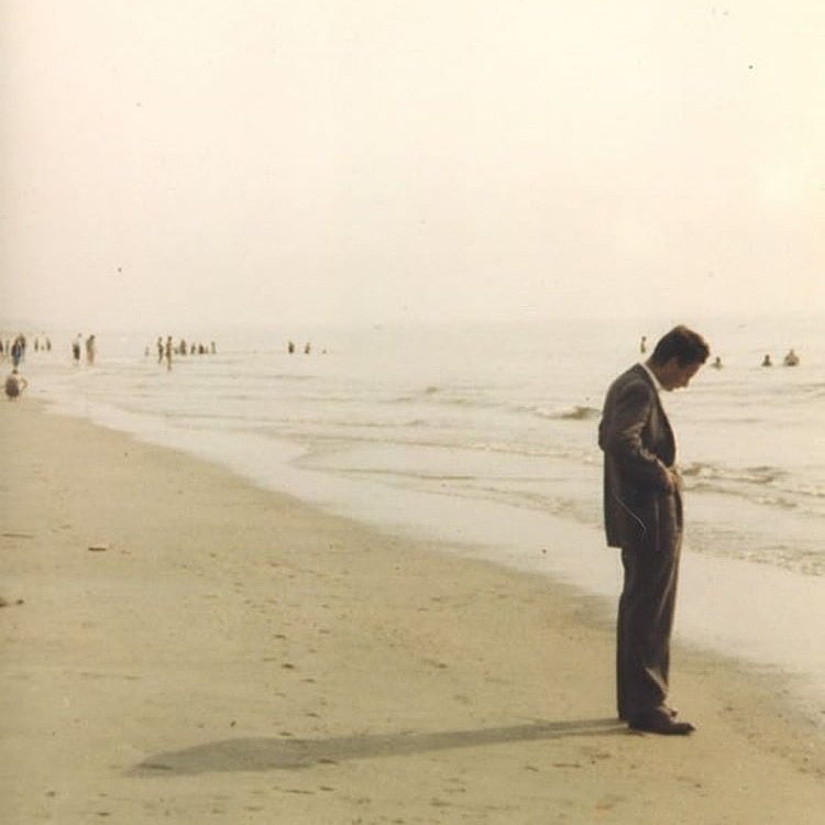 I stand at the seashore, alone, and start to think.
There are the rushing waves
mountains of molecules
each stupidly minding its own business
trillions apart
yet forming white surf in unison.

Ages on ages
before any eyes could see
year after year
thunderously pounding the shore