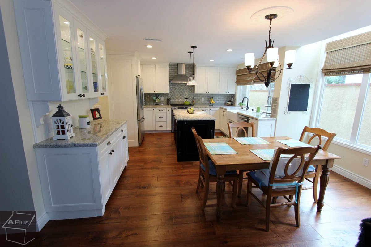 Rustic, traditional kitchen remodel with custom white cabinets, stainless steel appliances, farm house sink & wood floors in city of Orange aplushomeimprovements.com/portfolio_page… #kitchenremodel #KitchenCabinetsOrangeCounty #cabinets #construction #customremodel #contractor #kitchencabinets