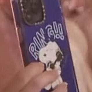 snoopy phone case at chappell roan coachella set fork found in kitchen