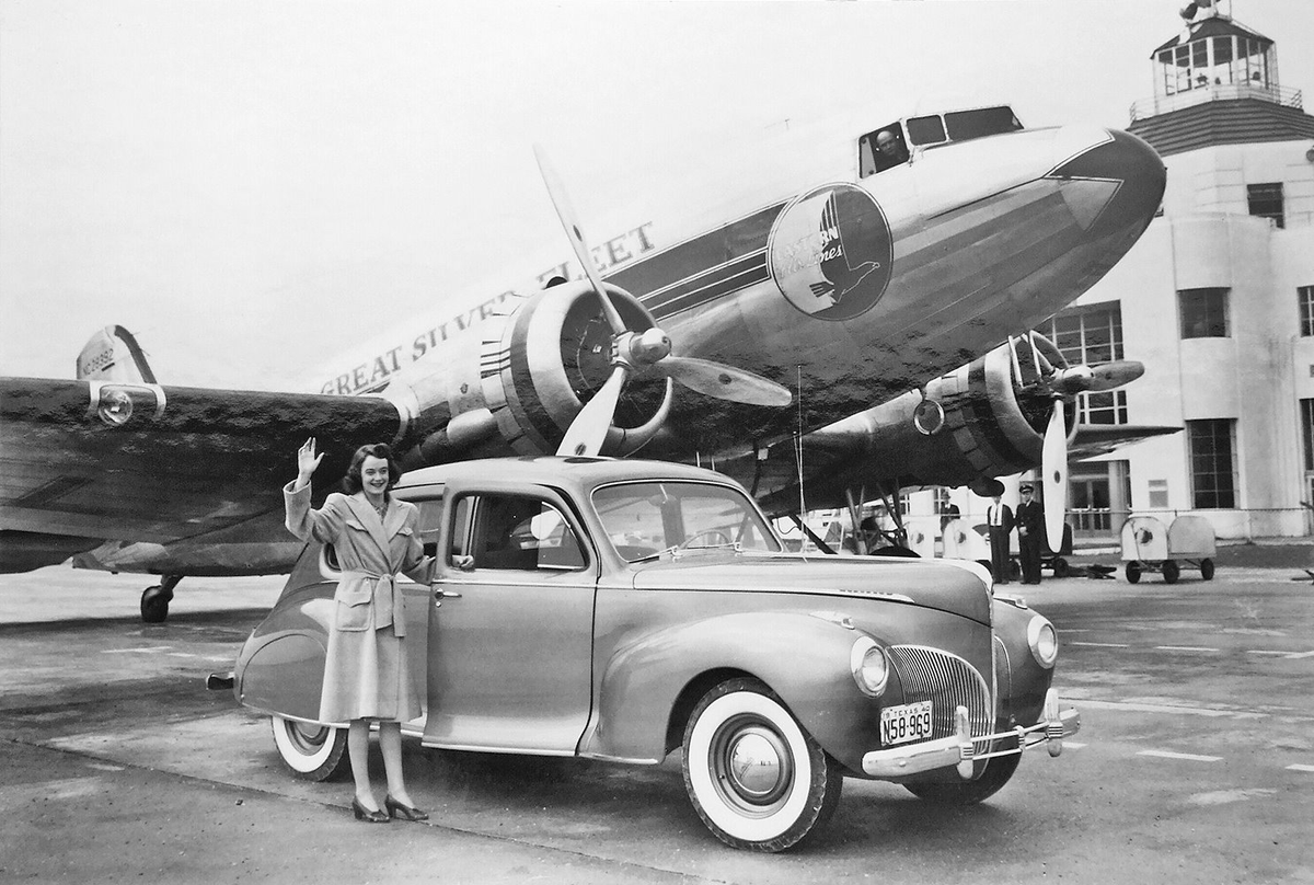 Woman posing with an awesome car and awesome airplane at Houston's Hobby airport, 1941. I believe that's a C-47 and that the car is a '41 Lincoln Zephyr, a two-door model, but I'll need to bring in you experts to confirm this. Pretty lady. Gorgeous photo.