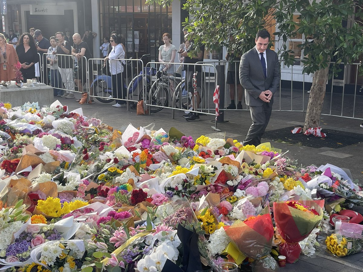 Scentre Group CEO Elliott Rusanow has just visited the memorial outside Bondi Junction. He hopes the centre will reopen by the end of the week but timing depends on when family members of the victims can come in, if they want to. Security to be reviewed across state.