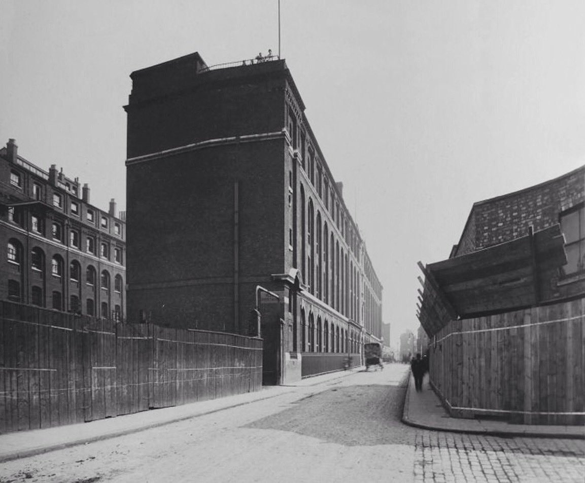 A view of the Whitechapel Union Infirmary, with people on the roof staring down at the photographer - until 1872, the building was the Union Workhouse and housed over 400 residents - it was eventually demolished in the 1960s... the-east-end.co.uk #eastend