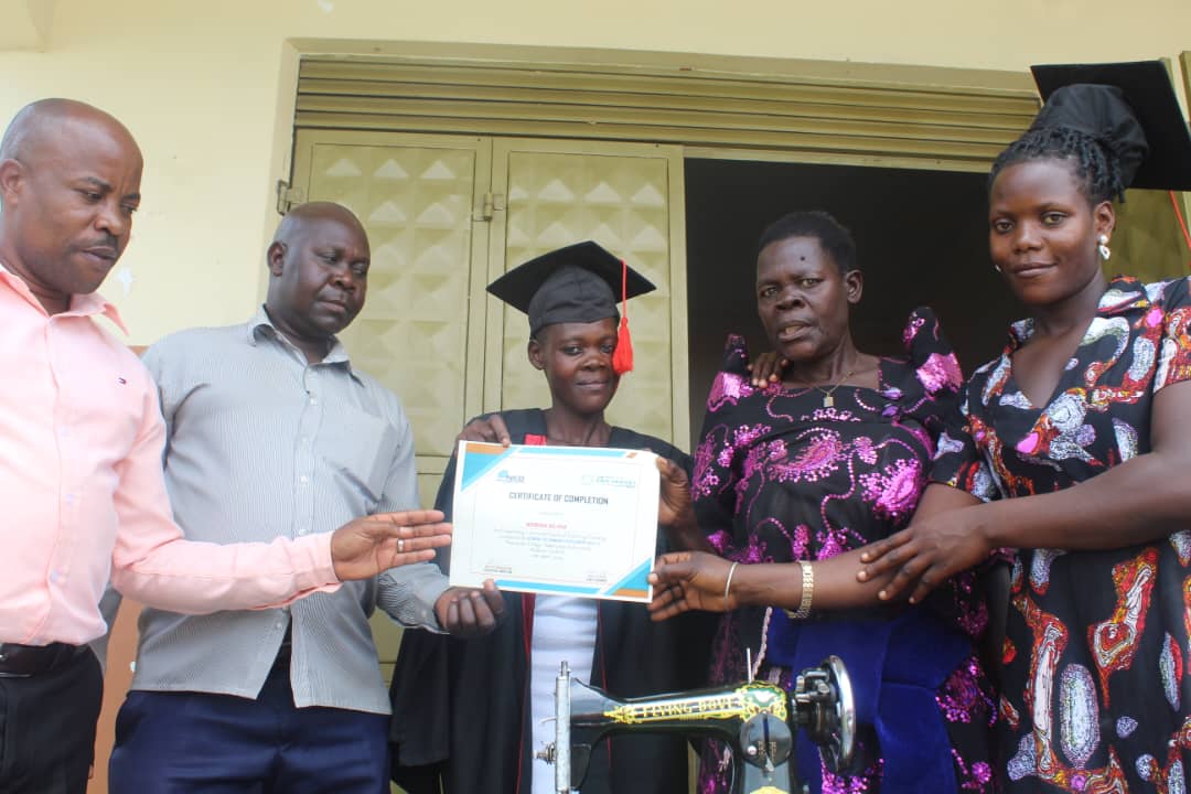 For a community to thrive, girls and women must be empowered with employable skills. With @PaulHodgesTrust , 20 girls/ women in Nakisunga Subcounty,Mukono, graduated after a one year training in tailoring. #EmpowerWomen.