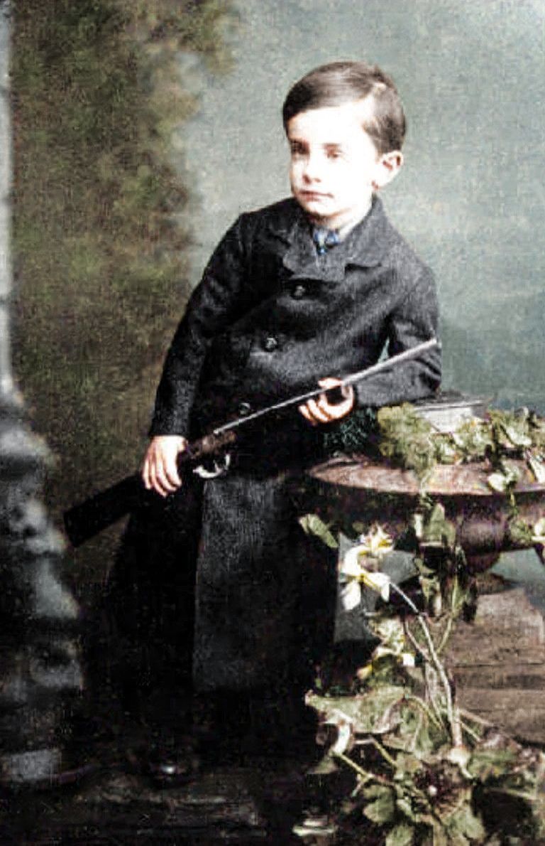 c1885, Young Pearse Leader of the 1916 Easter Rising Pádraig Pearse poses with a toy gun age six, the rare photo of the Irish hero poignantly predicts his destiny to lead Ireland’s fierce struggle for independence. 📷 Eugene O’Loughlin #Irish #History #PadraigPearse #Colourised