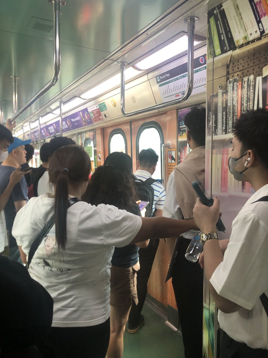 something depressing about the fact that the lrt-1's walls are decorated with a backdrop of shelves full of foreign books, all while readership has been decreasing since the pandemic and is at a low in the philippines