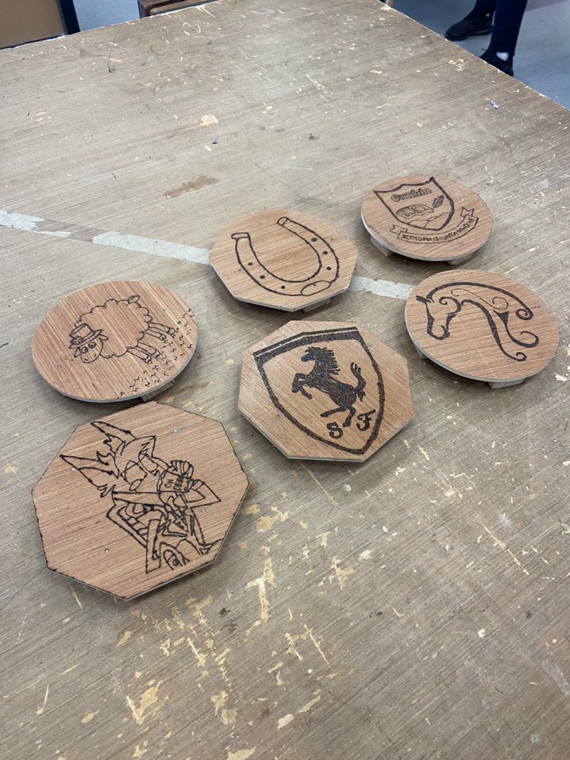 What fantastic progress our 1st yrs have made with their Woodworking skills since joining us in September. These unique tea-pot stands test their abilities at a cross-halving joint, chisel work, scroll saw use & pyrography! Well done all!