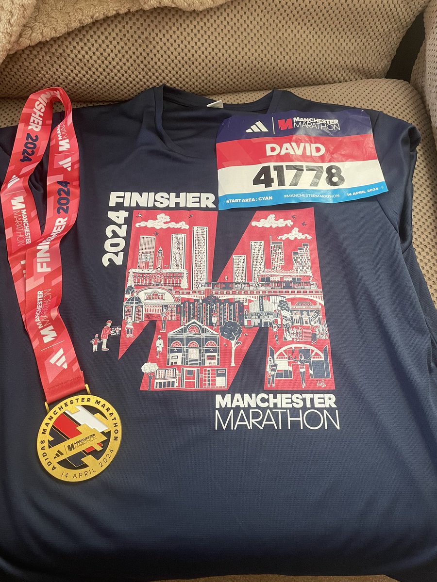 Mission accomplished. Sub 5 marathon and knocked 40 minutes off my pb. Last 5 miles were my hardest ever with constant calf cramps. Glad I took today off work. 😀 #ManchesterMarathon