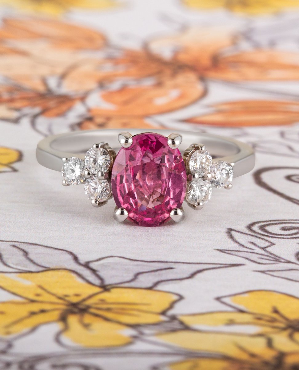 We are starting off your week in pink 🩷

This unusual vintage oval engagement ring features a natural pink sapphire, set with a trefoil of round brilliant cut diamonds on each shoulder.

Model no: 3787

#pinksapphire #sapphireengagementring #engagementring