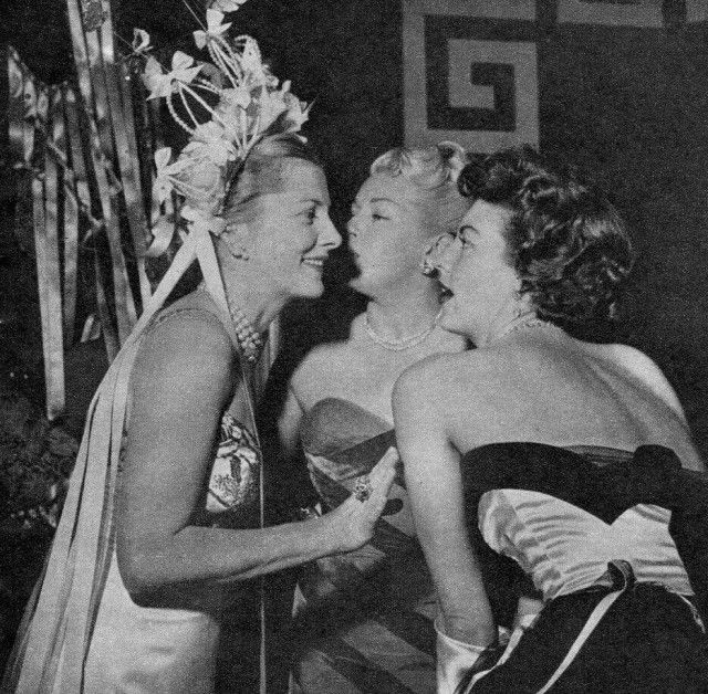 Joan Fontaine, Lana Turner and Ava Gardner at a party, 1951