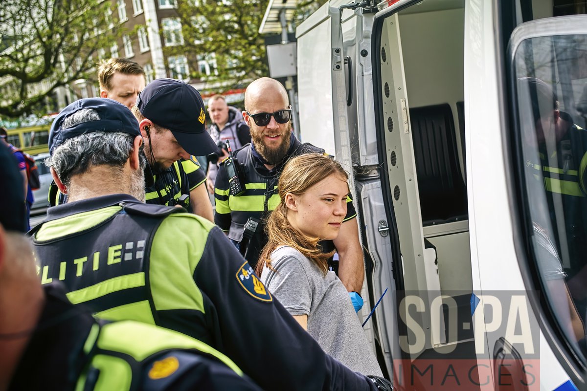 sopaimages's tweet photo. #GretaThunberg got #arrested with other protesters as she was #blockingtheroad (S100) in #TheHague, #Netherlands on Apr 6, 2024. A small group of protesters blocked the road (S100) in the centre of The Hague during an #ExtinctionRebellion movement. ๐ท Norbert Voskens https://t.co/vwEdY6KGad