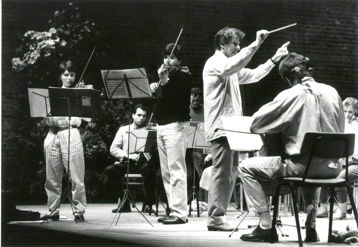 Born #OTD 100 years ago, Sir Neville Marriner, who made several fine recordings of Britten, is seen here during the 1988 Aldeburgh Festival rehearsing Schnittke's Concerto Grosso No. 3 with the Britten-Pears Orchestra. Photo: Nigel Luckhurst