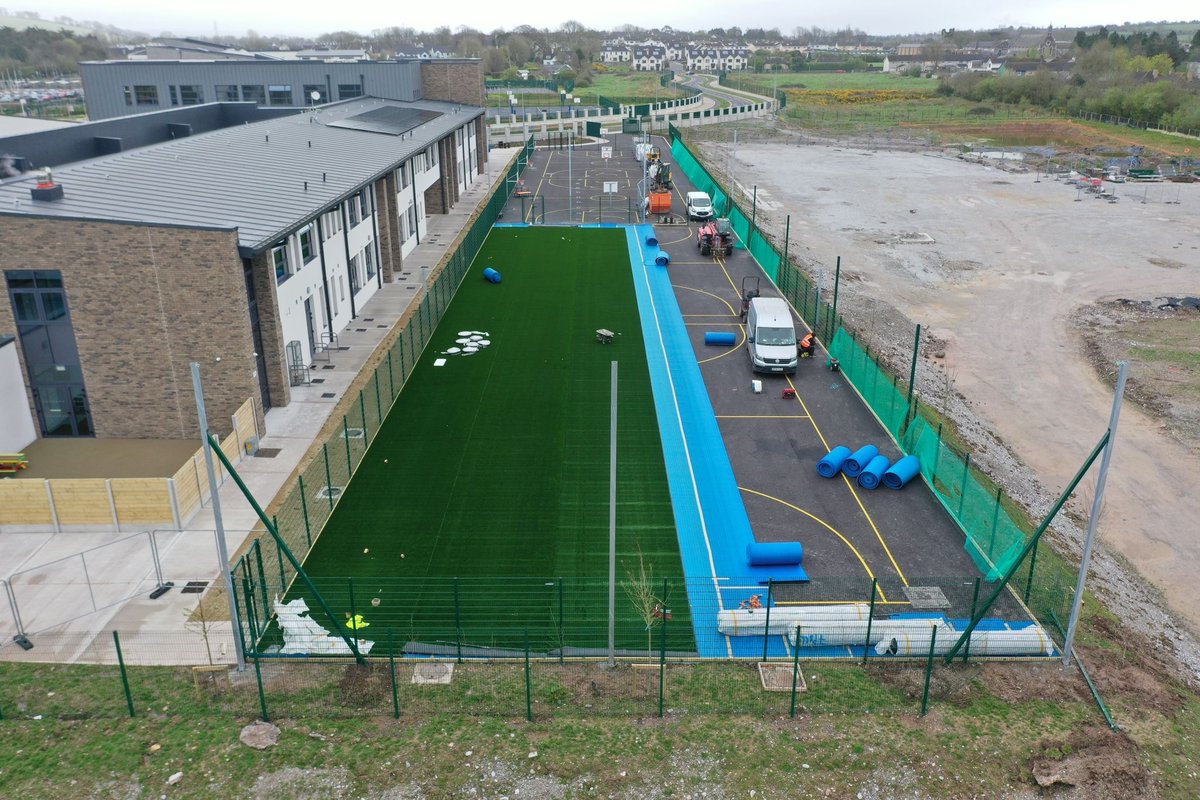 Netting posts installed and we’re rolling out the carpet at Scoil Mhuire Naofa in Carrigtwohill Co. Cork for a 62m x 25m artificial grass pitch. 
#ArtificialGrass #OutdoorPlay #SchoolSports