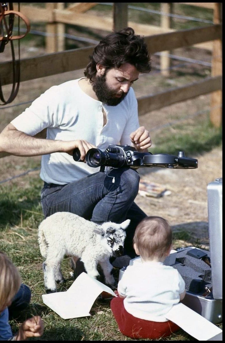 Paul McCartney, daughter Mary and a little lamb, Scotland 1970.