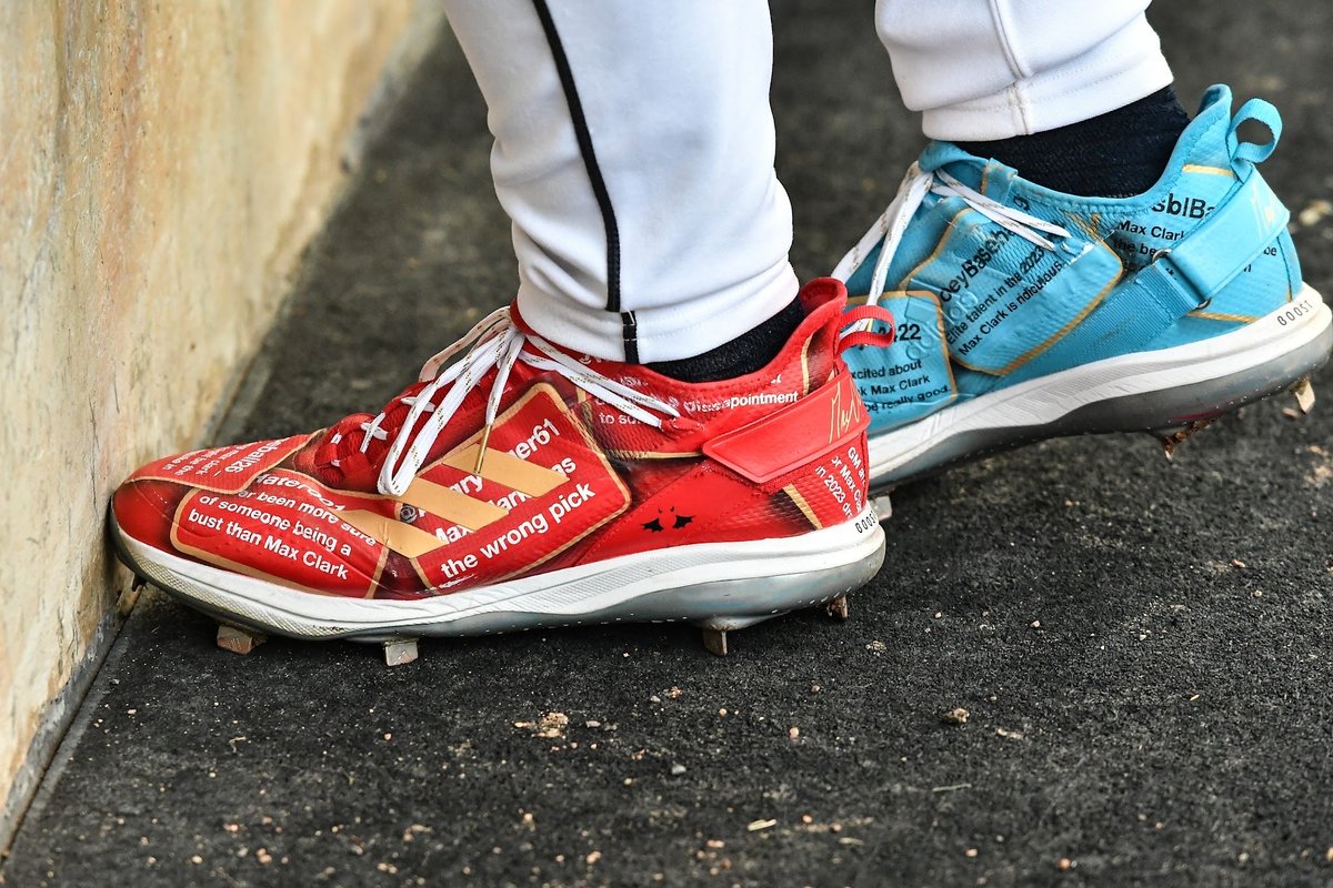 Max Clark has cleats for his haters! The @Tigers' No. 1 prospect wears a red cleat on his left foot with real posts talking about how he was the wrong pick and will be a bust. On the right, a blue shoe with words of praise and affirmation: atmlb.com/4d09epB