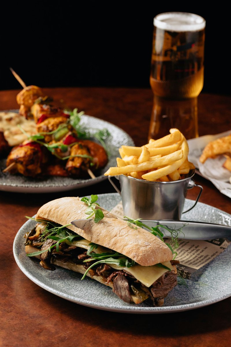 Stop scrolling! We've got some food for the soul 🤤 From Chip Shop Platter to Philly Cheese Steak Sandwich, our Bar & Late Night Menu classics are here to save the day when you're fancying comfort food 👏🏼