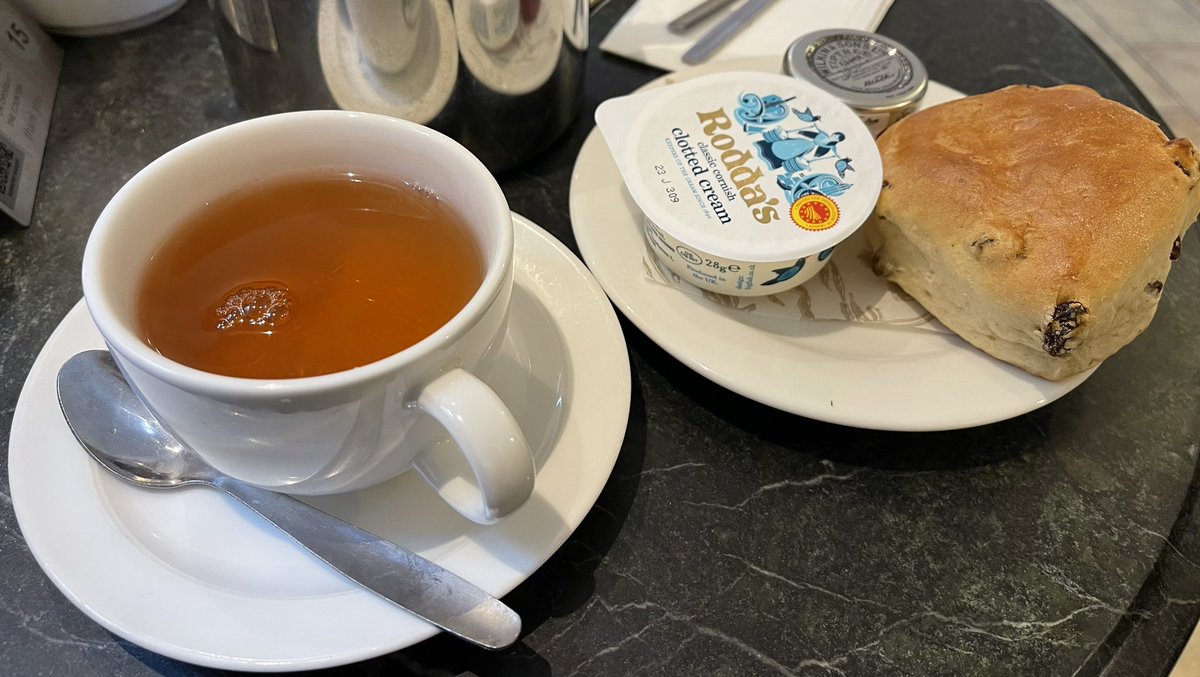 Have you ever had English cream tea? At first I thought it was just adding milk to tea. But actually it refers to using clotted cream on a fruit biscuit or scone with a dollop of jam. Clotted cream is made by heating milk using steam and leaving to cool slowly. #creamtea #travel