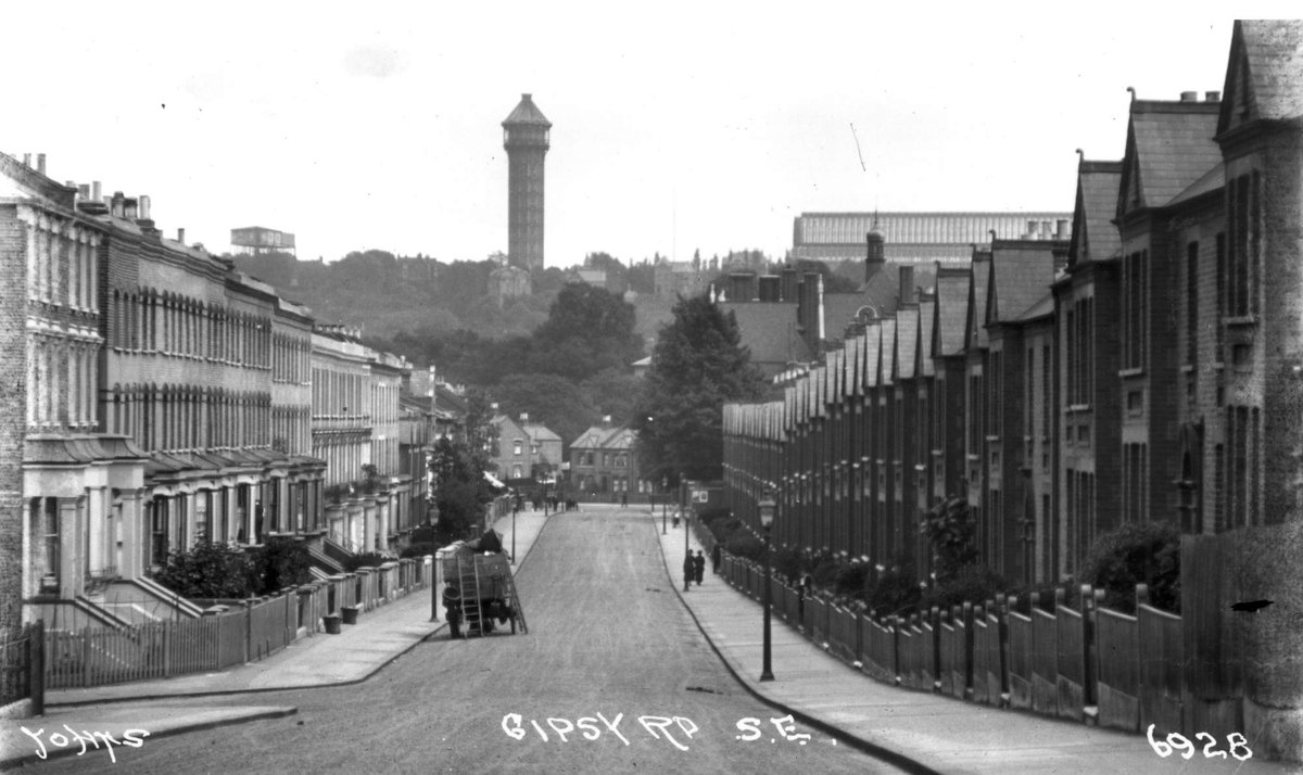View looking down Gipsy Road towards Crystal Palace. c1920. St. Gothard Road on the left. The Crystal Palace can be seen on the hill. The Palace burnt down in 1936. @LOVESE19