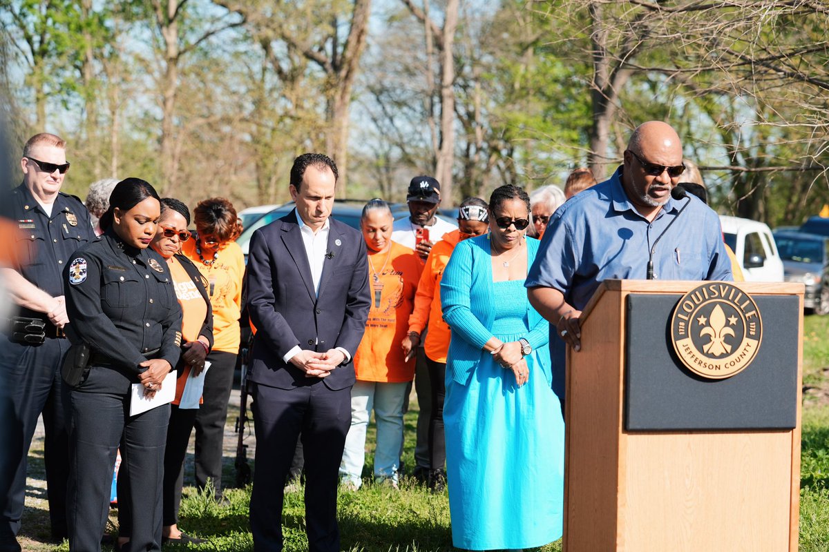 LouisvilleMayor's tweet photo. Louisville joined together this morning at Chickasaw Park to remember the two lives lost a year ago today and to recognize the urgent work we must do to end gun violence in our city. Let’s live in dialogue and find real solutions to protect lives. https://t.co/WNXKbXZ3CJ