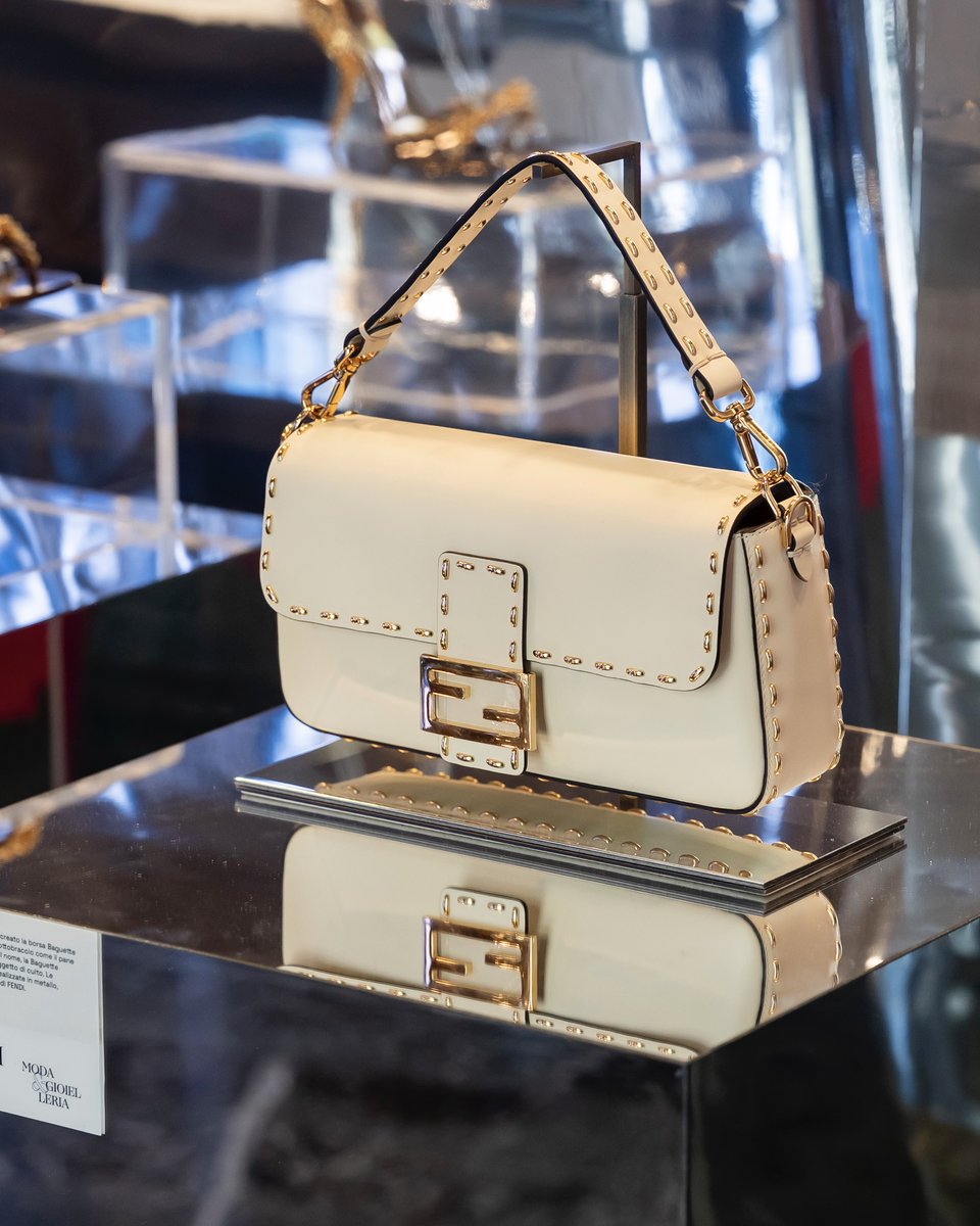 A #FendiBaguette with a metal interpretation of #FendiSelleria craftsmanship is currently on display at the Italian Ministry of Enterprises and Made in Italy as part of an exhibition sponsored by Altagamma entitled Lo specchio delle eccellenze italiane. The exhibit marks Made in